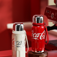 Coca-Cola-Termo Clásico Oficial Original de Acero Inoxidable 316 Grado alimenticio Fría/caliente hermética Tapa dual Filtro incorporado Portátil/Asa/correa/Boca Ancha antideslizante 580ml Blanco/Rojo