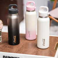 Coca-Cola-Termo Estilo Deportivo Oficial Original de Acero Inoxidable 316 Grado alimenticio Fría/caliente hermética Portátil Apertura y cierre con un solo dedo Doble función de tapa Pajita antideslizante 600ml Blanco/Negro/Rosa>200