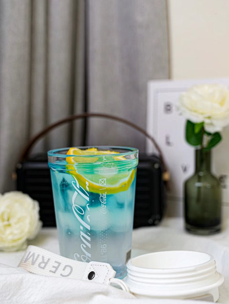 Coca-Cola Oficial Original-Vaso Tritan-Plástico Alimenticio Resistente a impactos resistente a químicos portátil Diseño de tapa de tirador desmontable hermético antideslizante 390ml Rosa/Púrpura/Verde/