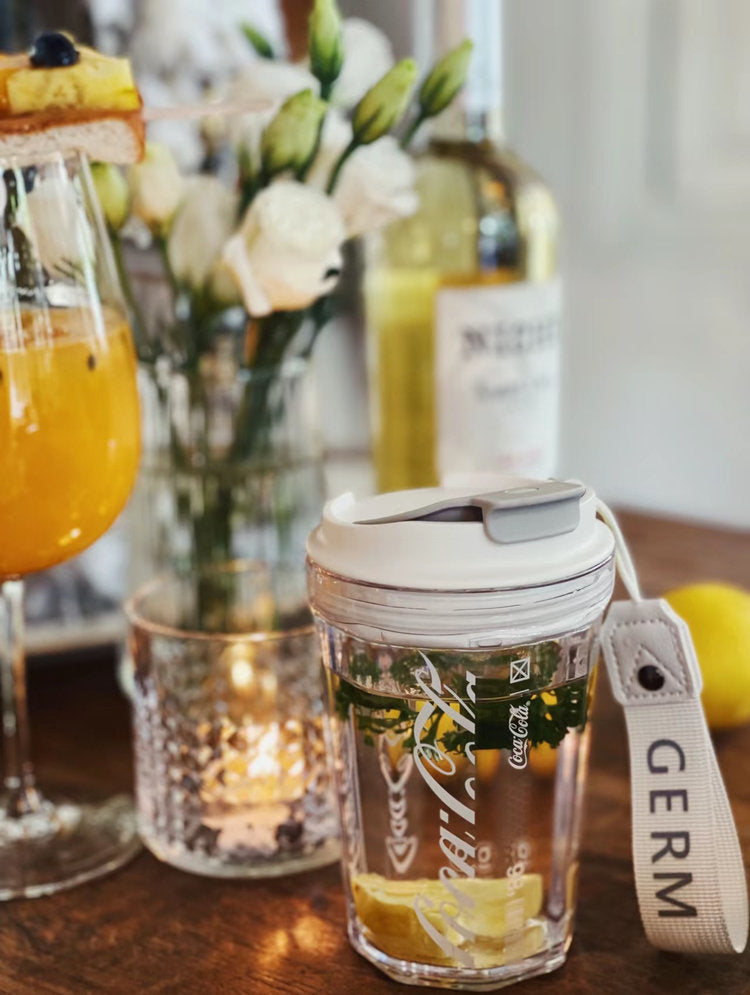 Coca-Cola Oficial Original-Vaso Tritan-Plástico Alimenticio Resistente a impactos resistente a químicos portátil Diseño de tapa de tirador desmontable hermético antideslizante 390ml Rosa/Púrpura/Verde/