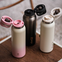 Coca-Cola-Termo Estilo Deportivo Oficial Original de Acero Inoxidable 316 Grado alimenticio Fría/caliente hermética Portátil Apertura y cierre con un solo dedo Doble función de tapa Pajita antideslizante 600ml Blanco/Negro/Rosa＞200
